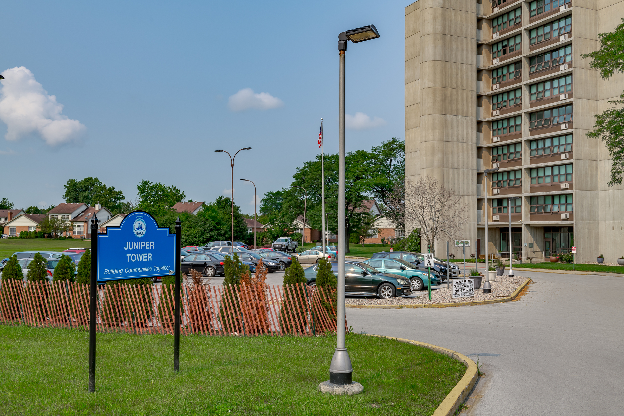 Outside view of Juniper Tower and parking lot